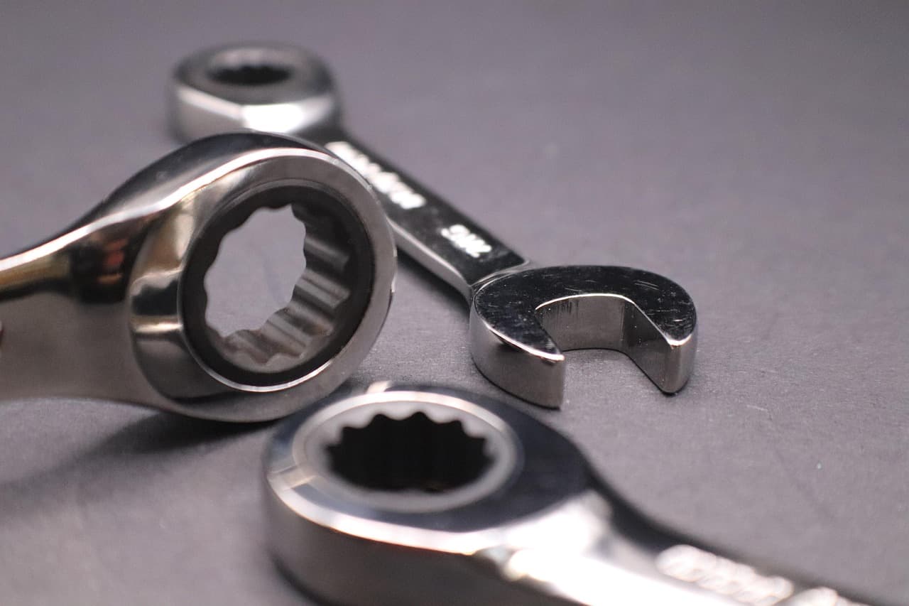 Ring spanners on a grey workbench